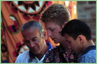 Three men in a market in Uzbekestan